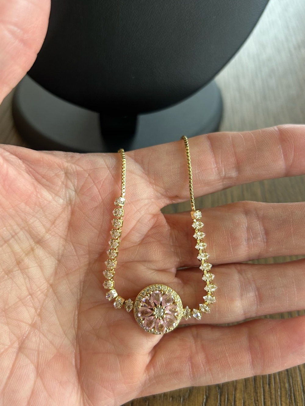 Gold-Plated Pink Crystal Floral Spinner Pendant Bracelet